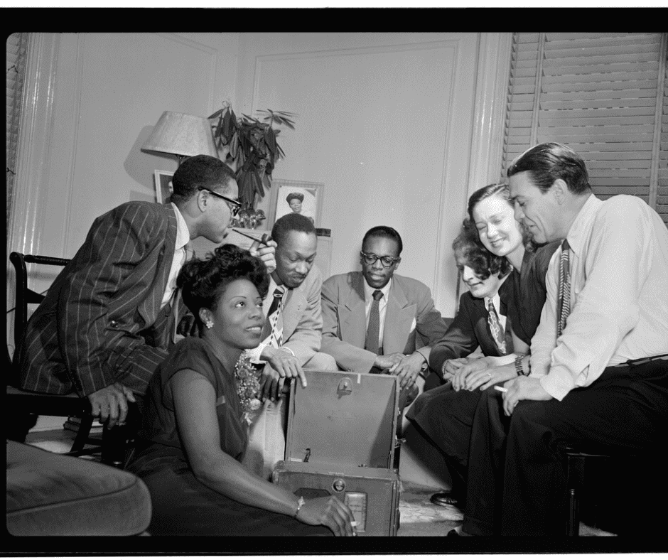 Dizzy Gillespie, Mary Lou Williams, Tadd Dameron, Hank Jones, Milt Orent, Dixie Bailey, and Jack Teagarden, Mary Lou Williams' apartment, New York, N.Y., ca. Aug. 1947 (William P. Gottlieb 09281)