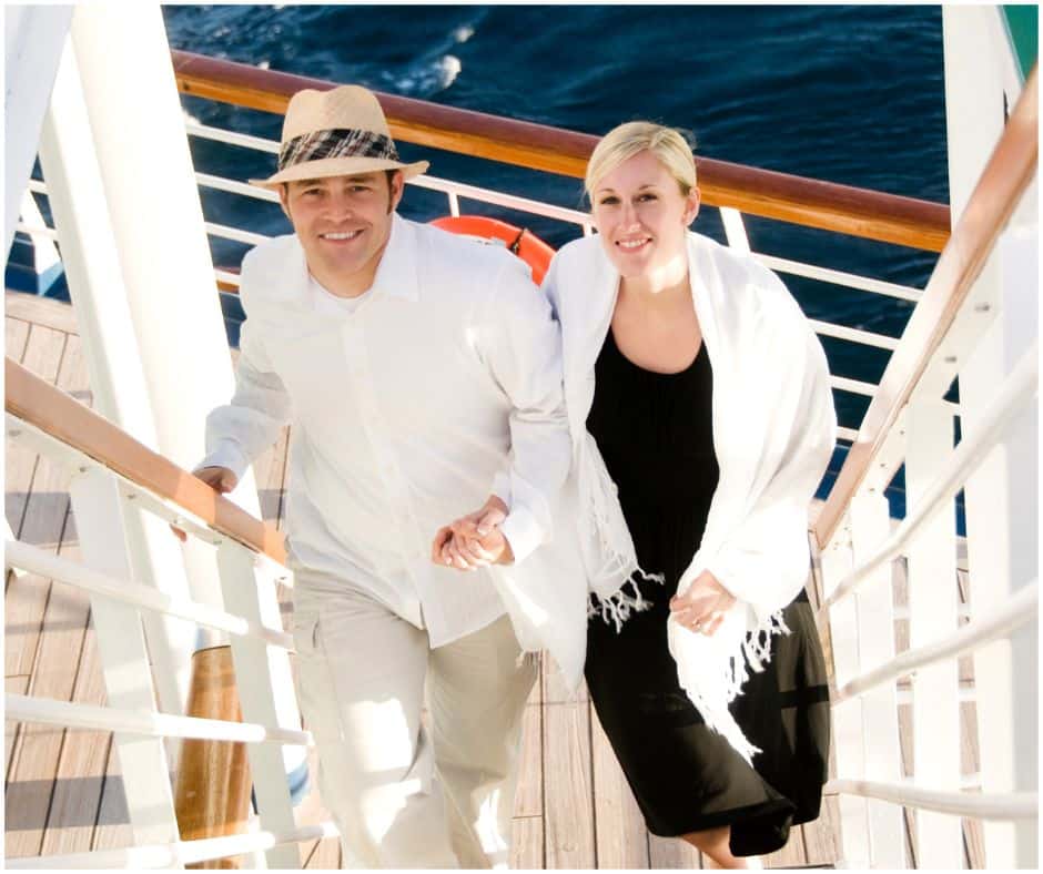 a couple dressed in jazz attire on a cruise ship