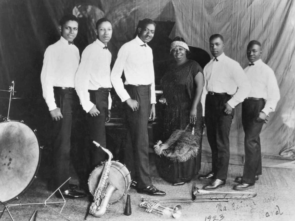 (Left to right, per Getty Image crediting): Ed Pollack, Albert Wynn, Thomas A. Dorsey, Ma Rainey, Dave Nelson, and Gabriel Washington in 1923.